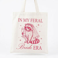 Custom In My Feral Bride Era Raccoon Canvas Tote Bag for Bride and Bridesmaids Funny Retro Y2K Gen Z Meme Aesthetic Bridal Shower Gift Bachelorette Party Favor Engagement Wedding Planning Reusable Grocery Shoulder Bag