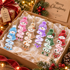 Six personalized snowman acrylic ornaments in various colors arranged inside an open gift box lined with tissue paper.
