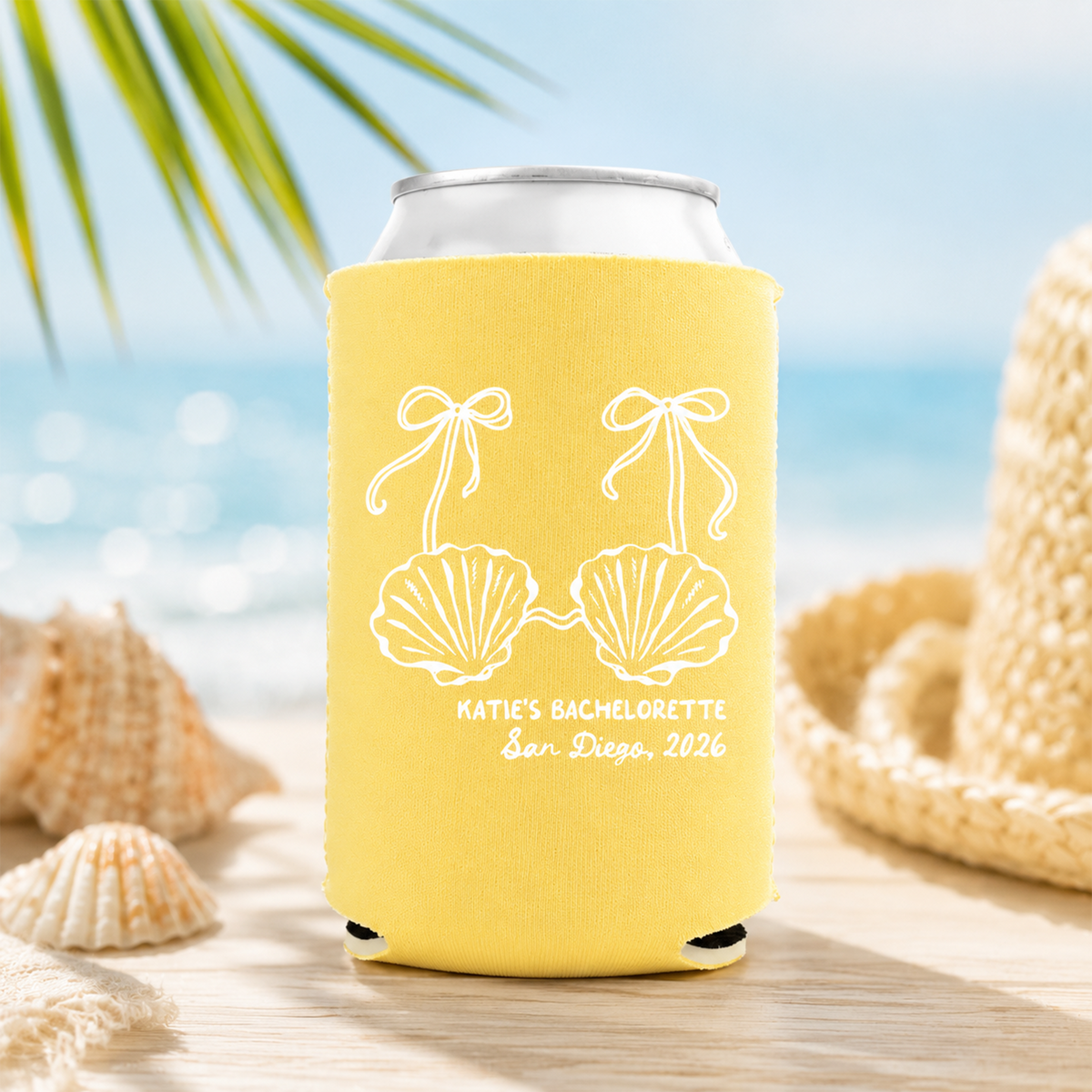 Yellow Custom Little Mermaid Bachelorette Can Coolers with shell bikini and ribbon print standing on sandy beach with