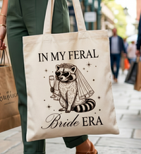 Custom In My Feral Bride Era Raccoon Canvas Tote Bag for Bride and Bridesmaids Funny Retro Y2K Gen Z Meme Aesthetic Bridal Shower Gift Bachelorette Party Favor Engagement Wedding Planning Reusable Grocery Shoulder Bag