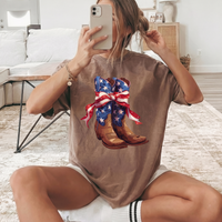 RodyThread Vintage Cowboy Boot Bow Graphic T-Shirt Patriotic 4th of July Western Cowgirl Oversized Tee American Flag Star Ribbon Boots Graphic Shirt Cute Country Music Concert Top Women American Flag Patriotic Cowboy Boots Graphic Tee