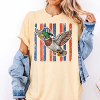 RodyThread Flying Mallard Duck Patriotic 4th Of July Graphic T-Shirt Unisex Men Women Retro Southern Western Aesthetic Cream Cotton Summer Independence Day Waterfowl Hunting Tee Apparel Vintage USA American Flag Country Outdoors Casual Top