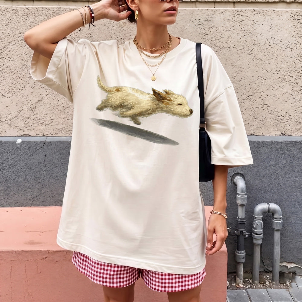 RodyThread Cute Running Dog Graphic Oversized T-Shirt For Women Trendy Vintage Aesthetic Soft Baggy Cotton Cream Tee Casual Streetwear Top Dog Lover Gift Perfect For Dog Walking Outfit Stylish Loose Fit Summer Short Sleeve