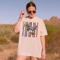 RodyThread Flying Mallard Duck Patriotic 4th Of July Graphic T-Shirt Unisex Men Women Retro Southern Western Aesthetic Cream Cotton Summer Independence Day Waterfowl Hunting Tee Apparel Vintage USA American Flag Country Outdoors Casual Top