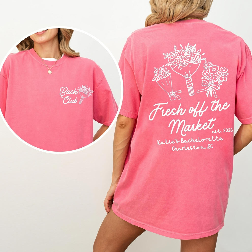 Bright pink oversized T-shirt featuring matching bridal squad floral graphics and custom event lettering.