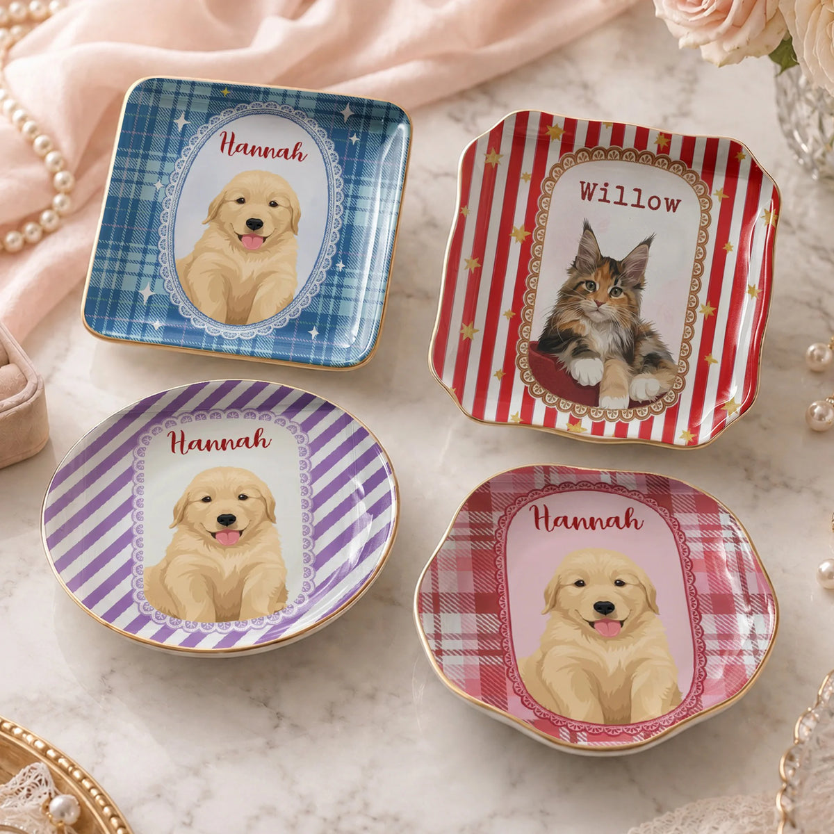 Four ceramic jewelry dishes featuring Golden Retriever puppy portraits and a cat portrait on a tabletop.