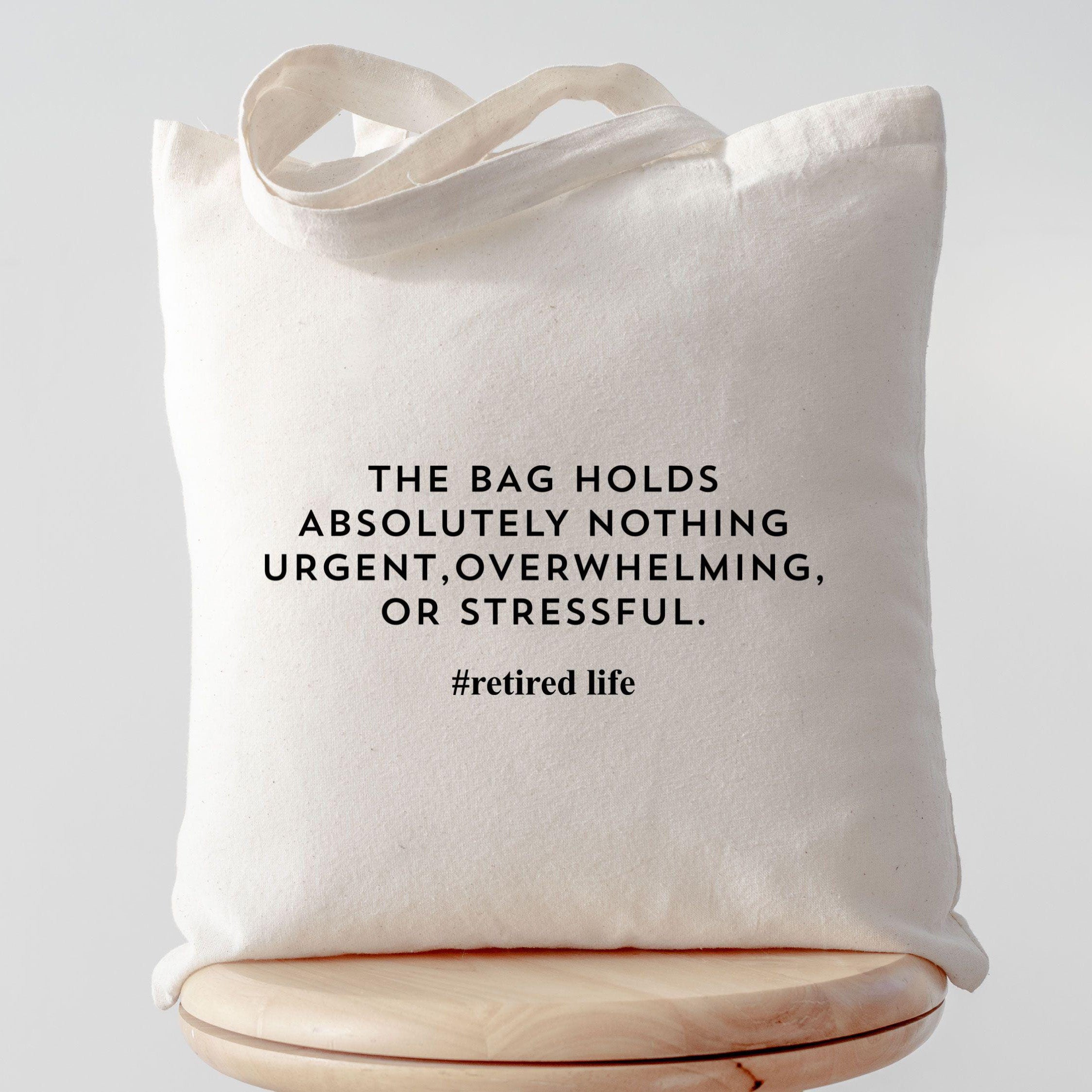 RodyThread Funny Retired Life The Bag Holds Absolutely Nothing Urgent Canvas Tote Bag For Retirees Men Women Minimalist Aesthetic Natural Beige Cotton Retirement Gift Bag Coworker Leaving Present New Retired Christmas Gift Funny Retirement Tote Bag