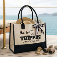 RodyThread We Be Trippin Canvas Tote Bag For Women Bridesmaids Girls Trip Preppy Coastal Vacation Aesthetic Two-Tone Black Beige Cotton Canvas Funny Bachelorette Beach Bag Destination Group Travel Gift Custom Shopper