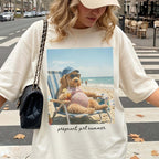 Ivory neutral relaxed fit tee featuring a goldendoodle meme graphic print perfect for a casual beach day or baby reveal.