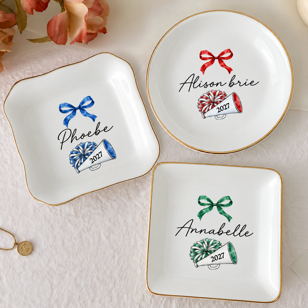 Close-up of Personalized Cheerleader Pom Pom Dish with Custom Name Gold Rim Porcelain Trinket Tray Gift for Squa for streetwear fans in Los Angeles