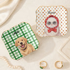 Two wavy-square ceramic display plates with gold rims, featuring a green gingham golden retriever and an orange polka dot