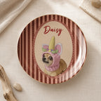 Round personalized pet memorial jewelry dish in burgundy stripes featuring a chihuahua portrait and name Daisy.