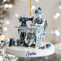 Close-up of Sewing Lady Delft Blue Porcelain Style Christmas Ornament, Personalized Custom Name Seamstress Gift, for streetwear fans in Los Angeles