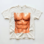 White crewneck novelty graphic t-shirt featuring a photorealistic chest print of a ripped male torso flat on a white surface.