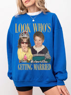 A bright royal blue personalized engagement shirt with custom childhood photos and gold text for couples celebrating their