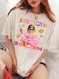 Woman wearing a cream custom photo t-shirt with retro Y2K glitter text and childhood photo graphic for a bachelorette party.