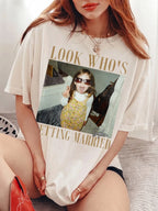 A woman wearing an ivory Getting Married Custom Photo T-Shirt featuring a childhood photo, gold serif text, and name.